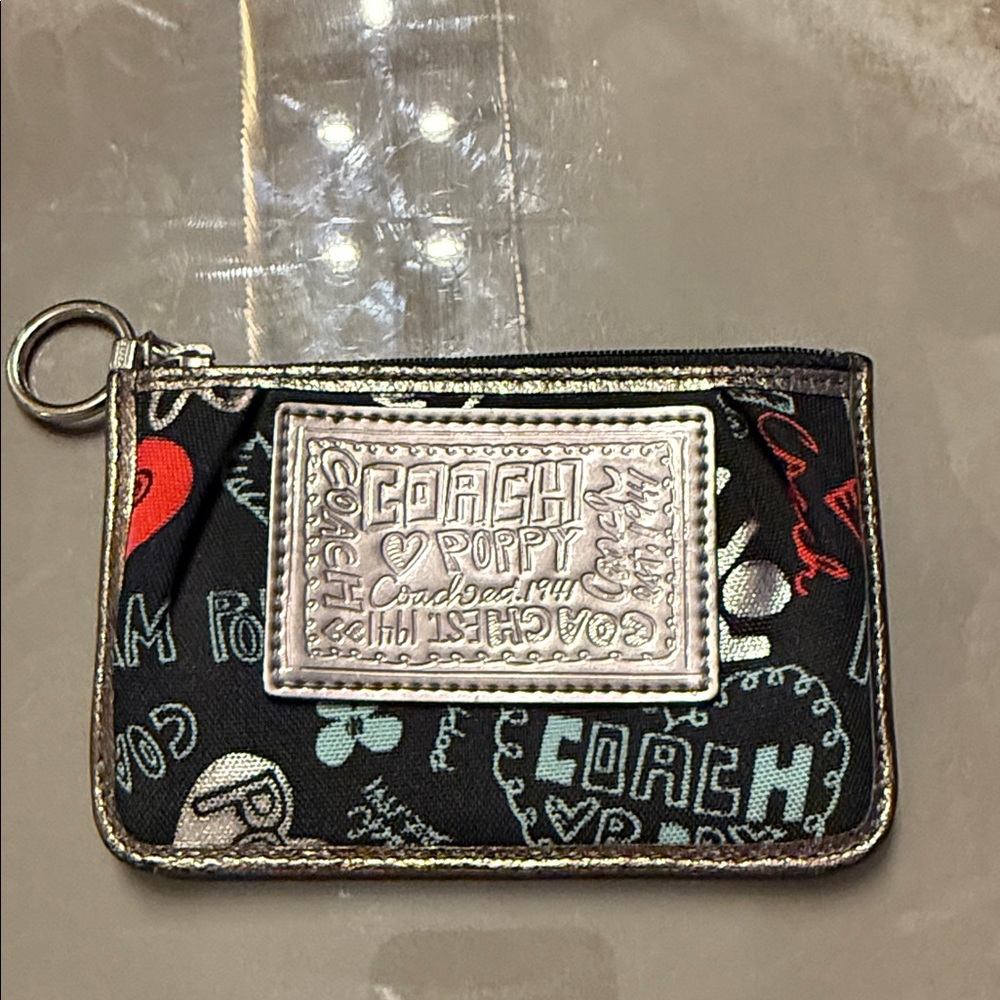 Coach Poppy Black and Silver Wristlet with Red Accents